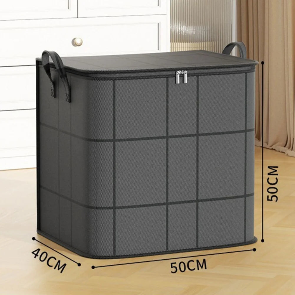 Medium size fabric storage bag in black and grey with visible zipper and dimensions displayed (50x40x50cm) in a bedroom setting.