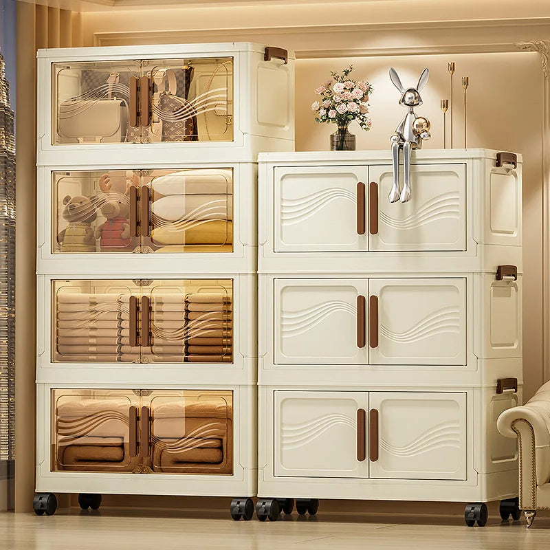 Foldable stackable storage cabinet with clear doors shown organized with towels and toys in a living room