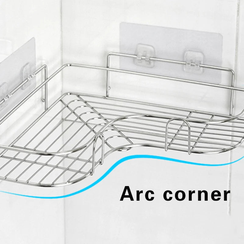 Close-up of arc-shaped edge on stainless steel adhesive shower shelf, showing clear adhesive mounting pads.