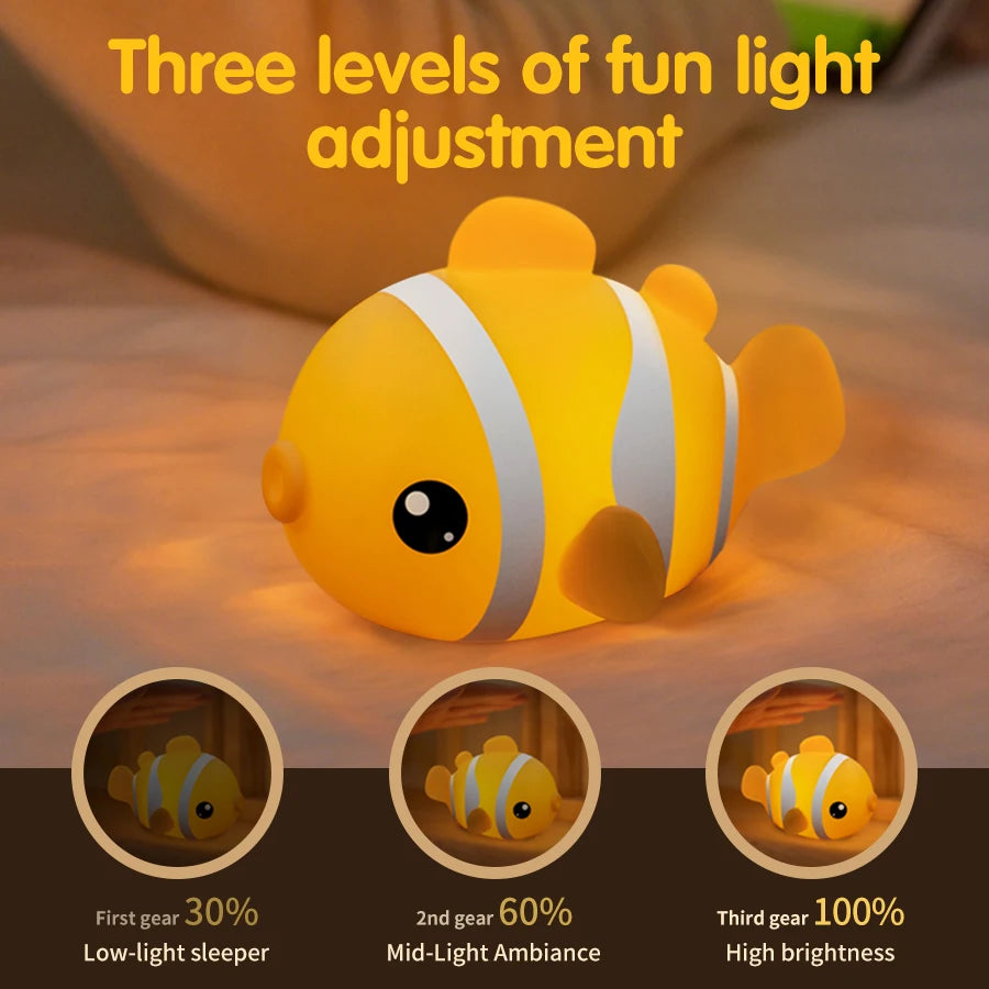 Clownfish silicone night light demonstrating adjustable three-level brightness feature