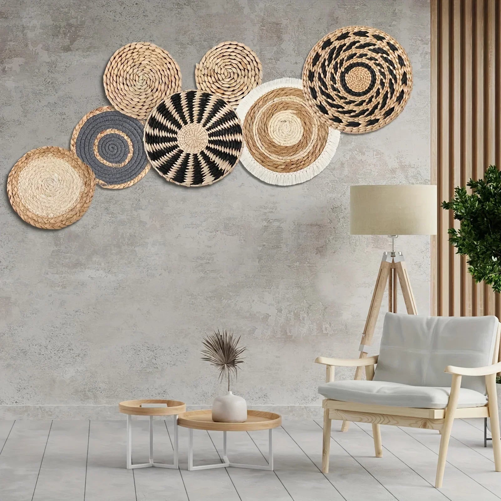 boho seagrass wall baskets arranged on a living room wall above a chair