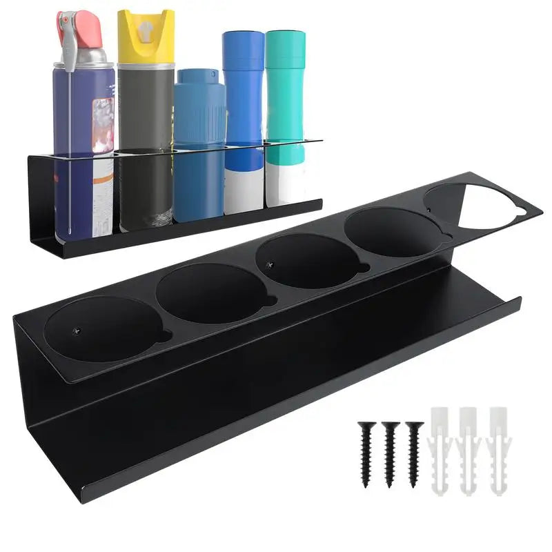 Black steel spray can organizer rack holding five assorted aerosol cans, wall-mounted with included hardware