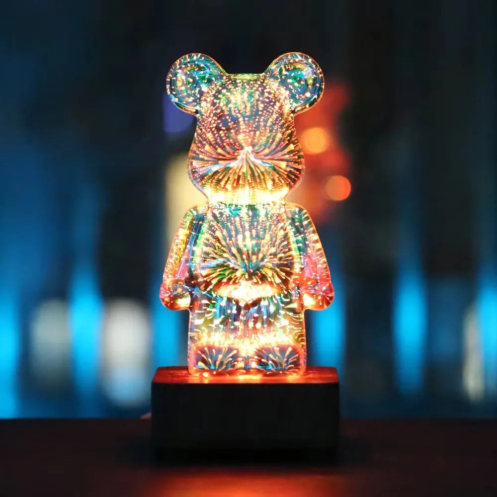 Colorful LED glass bear night light glowing in a dark room
