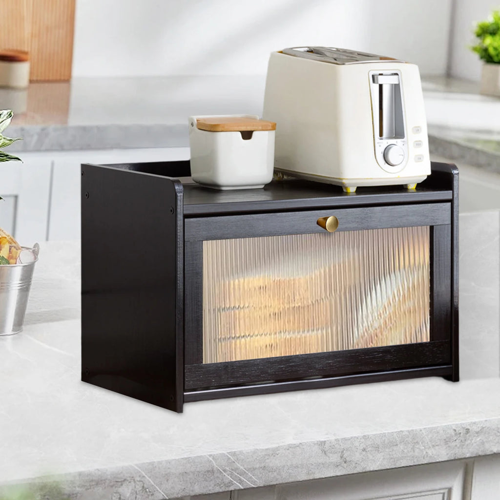 Black bamboo bread box with acrylic door displayed on marble kitchen counter
