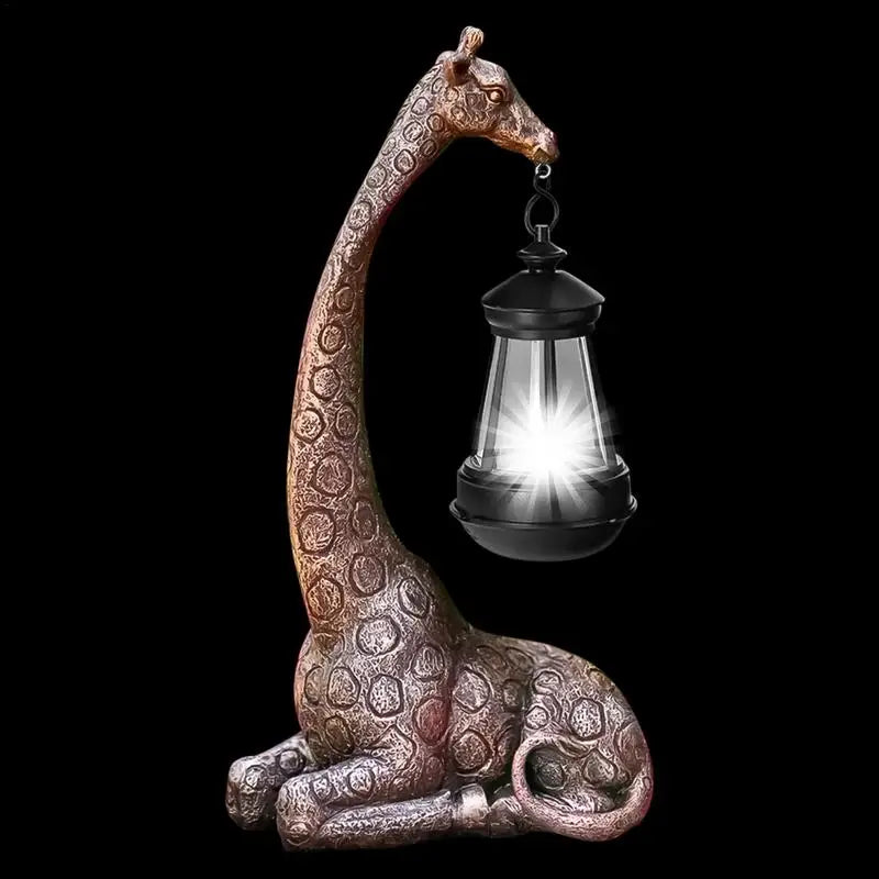 Bronze giraffe solar lantern glowing in the dark for outdoor decor