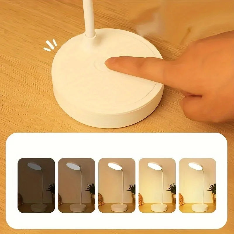 Close-up of touch control button on LED desk lamp base with dimming brightness levels shown