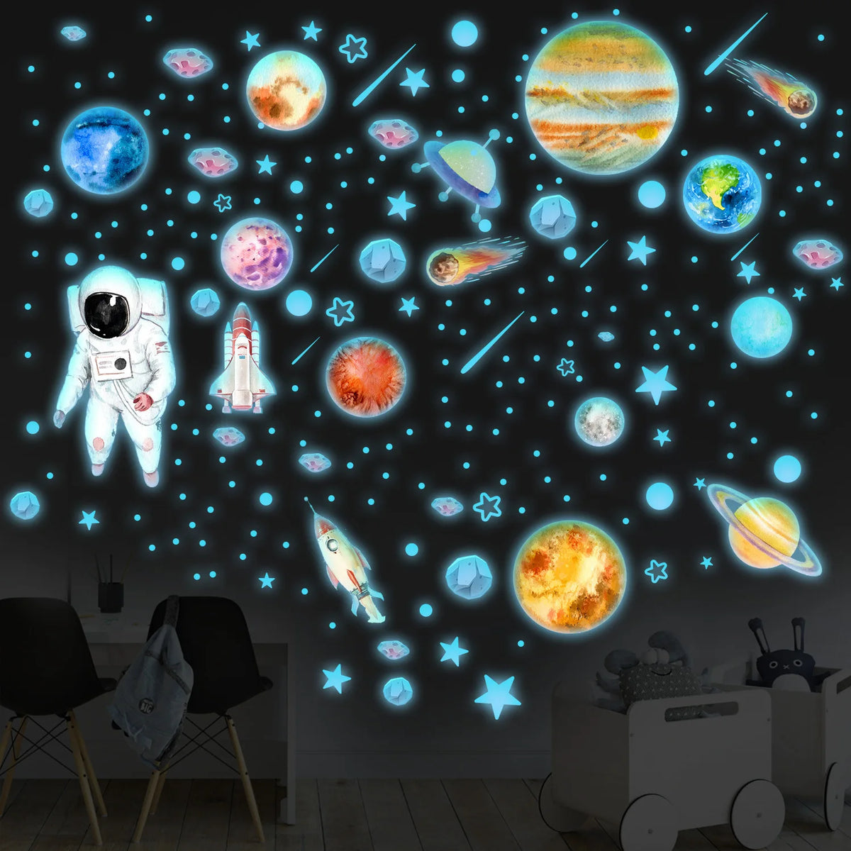 glow in the dark planet and astronaut wall decals on a dark nursery ceiling