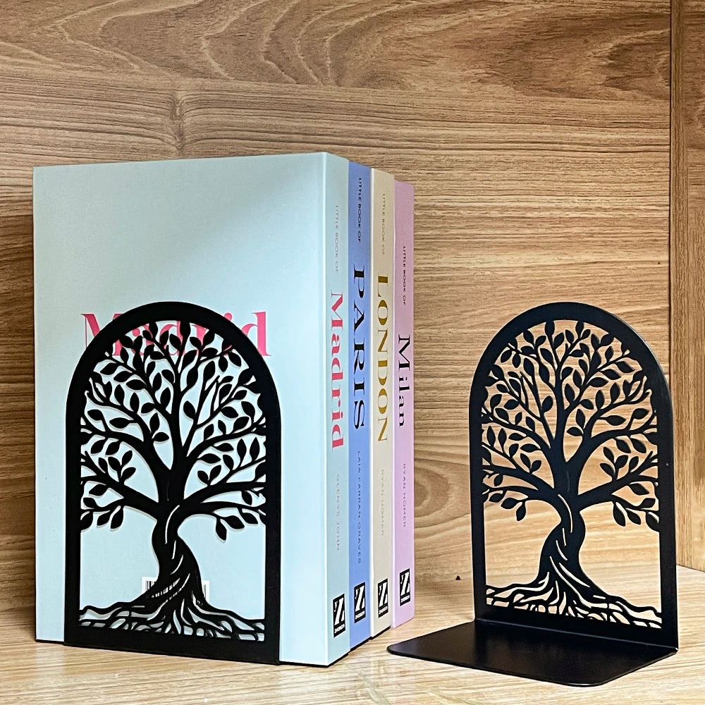 Tree of Life metal bookend holding pastel-colored books on a wood bookshelf