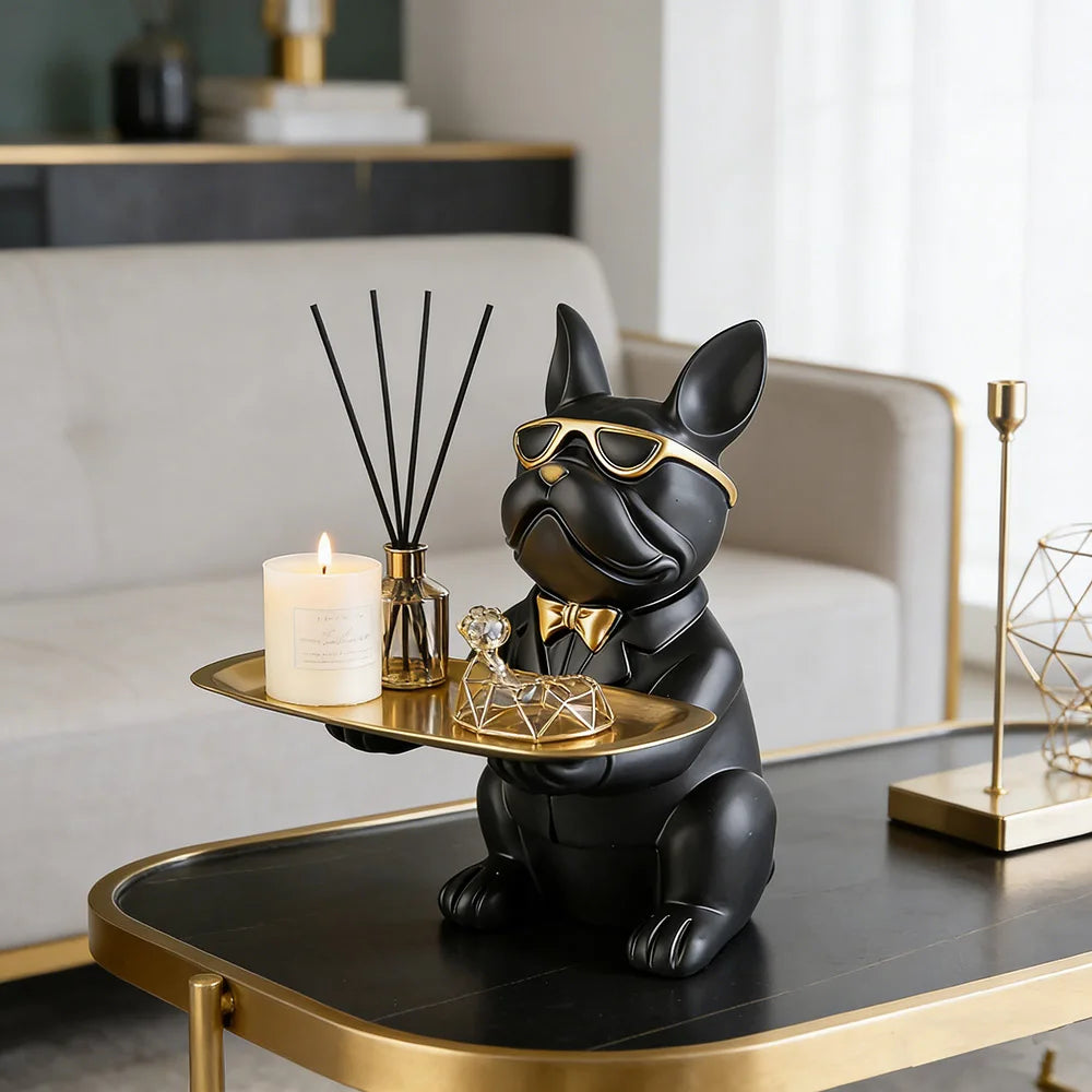 bulldog statue tray styled with candle, diffuser, and jewelry in a living room