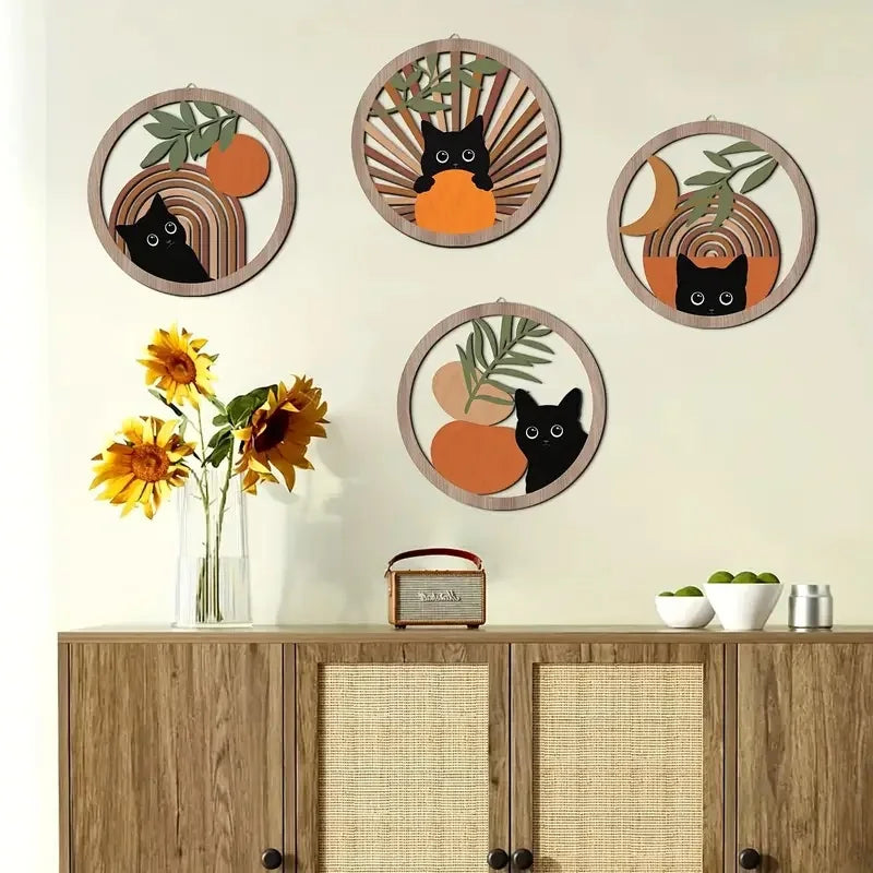 Set of four round boho cat wooden wall hangings displayed above a cabinet in a living room with sunflowers and neutral decor