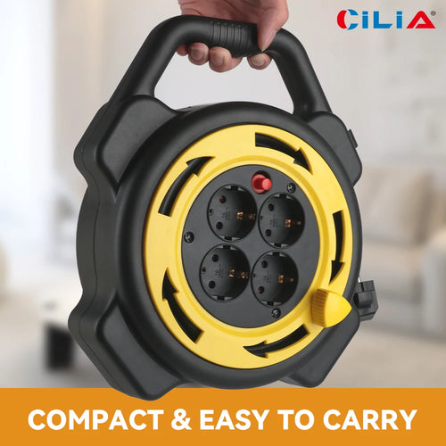 Retractable extension cord reel with carry handle and four EU sockets shown in hand in a living room