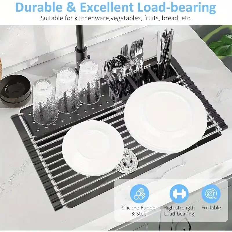 Stainless steel over-sink dish drying rack holding glasses, plates, and utensils on a kitchen sink