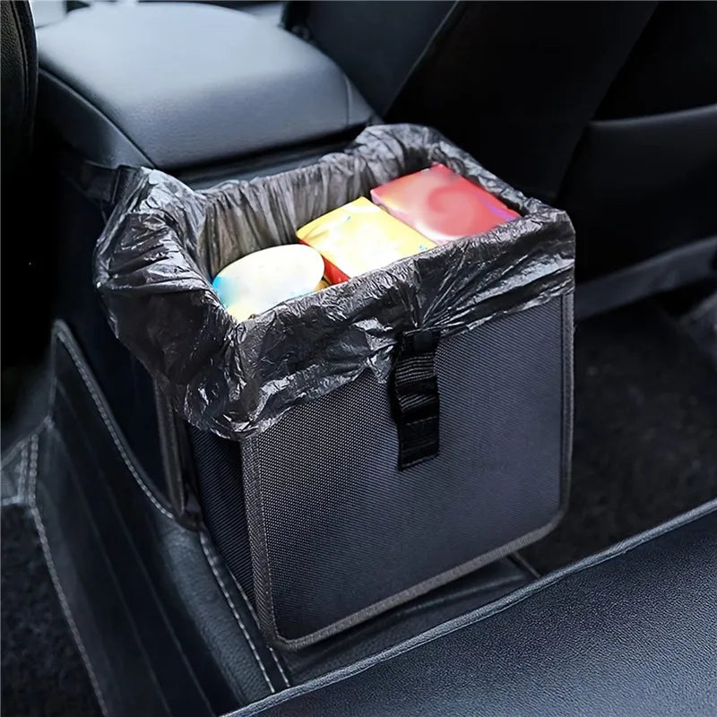 hanging car trash can in black Oxford cloth attached to center console with a liner bag and small trash inside