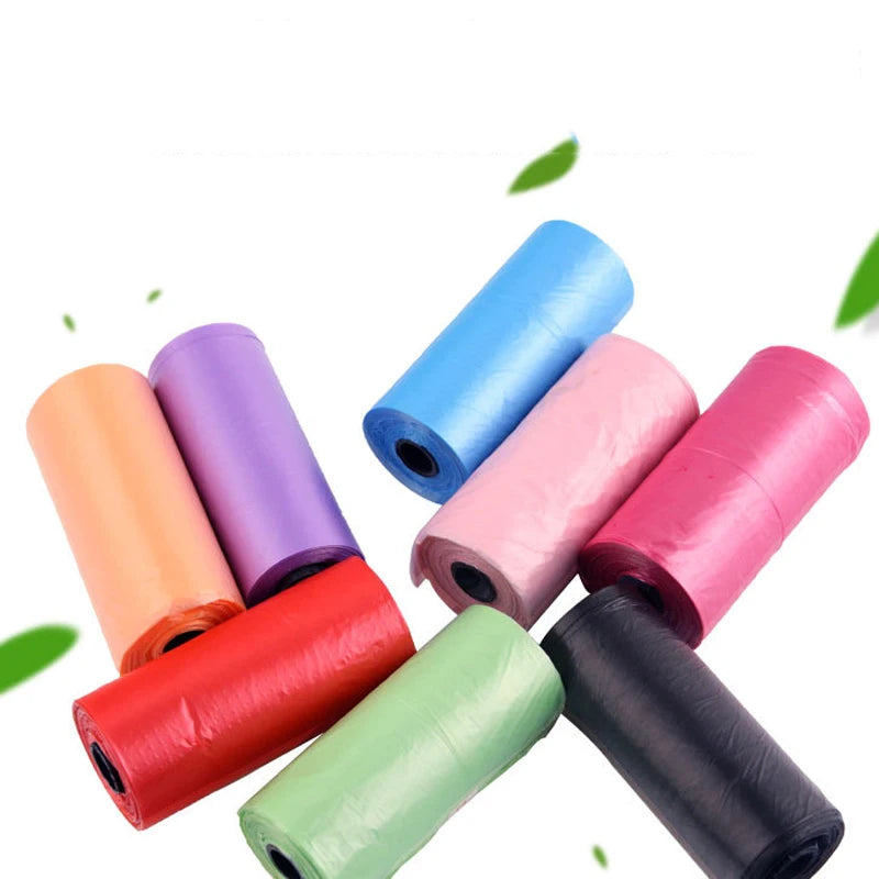 Assorted colorful rolls of compact trash bags for car or small waste bin use