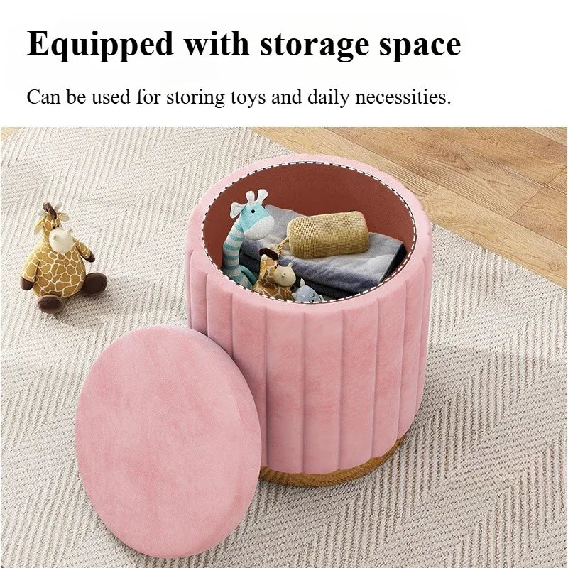 pink round storage stool with removable lid, shown holding toys and daily essentials