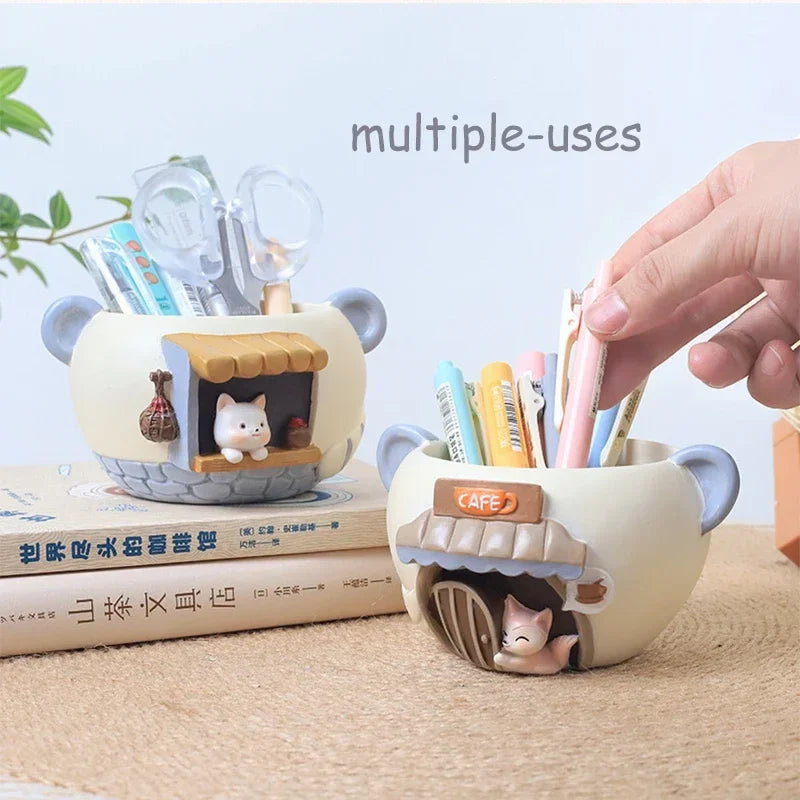 Mini resin animal planters used for desk supplies like pens and scissors