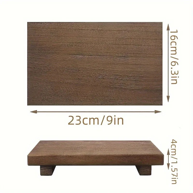 Top and side view of wooden riser tray with measurements: 23cm by 16cm by 4cm