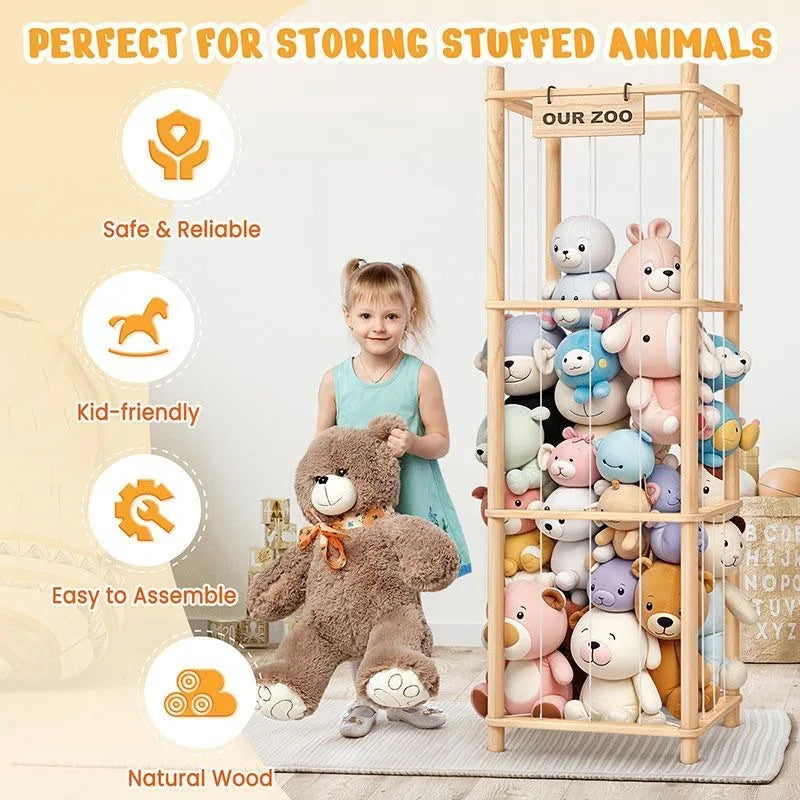 Young child standing by a wooden organizer shelf filled with plush toys in a playroom