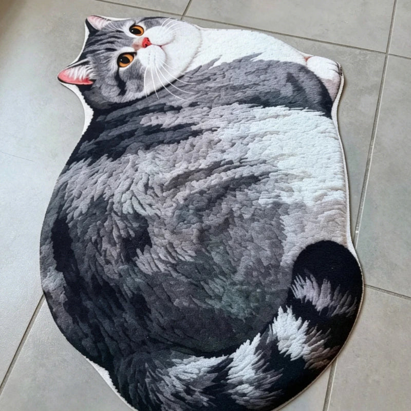 Gray and white cat shaped mat with textured fur print on tiled floor