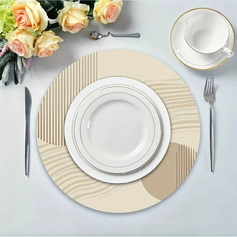 Round beige minimalist placemat with geometric pattern on a dining table setting