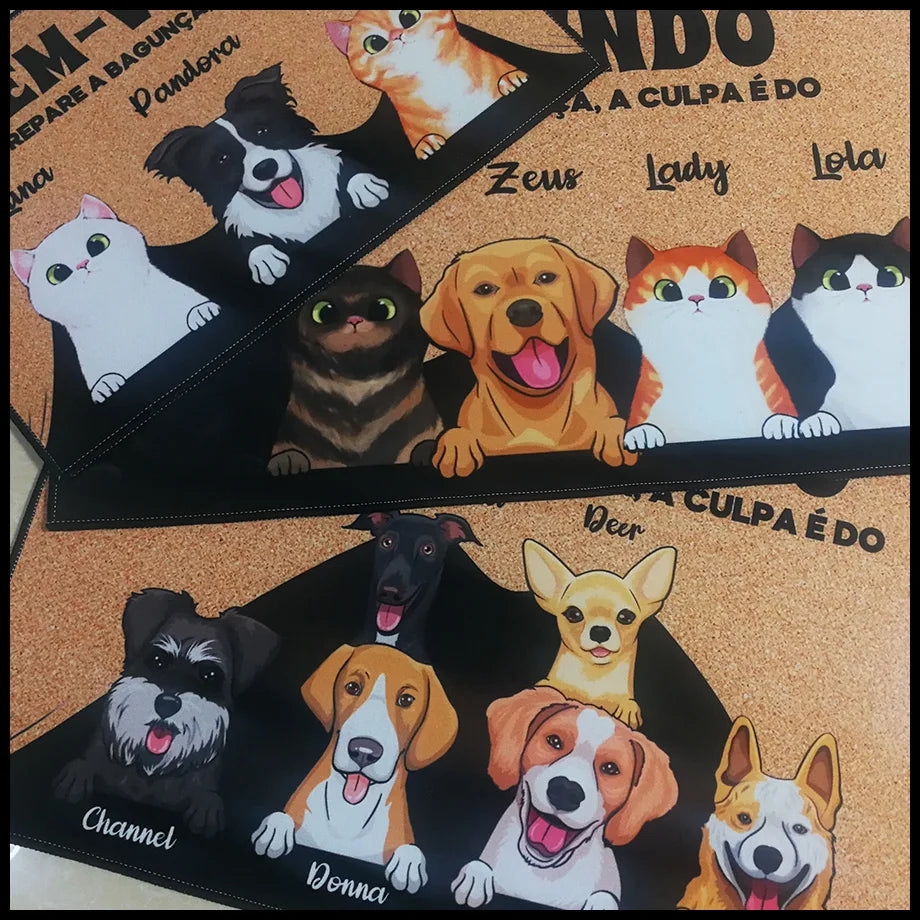 Closeup of doormats with custom cartoon pet and name designs for entryway use