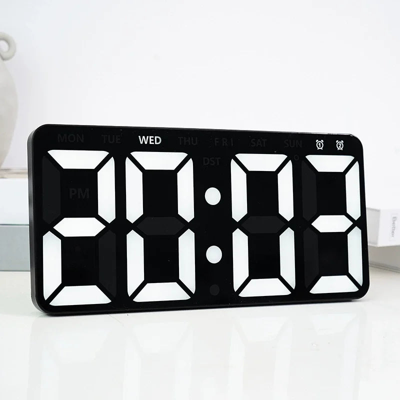 LED digital wall clock with white display placed on desk, geometric modern styling