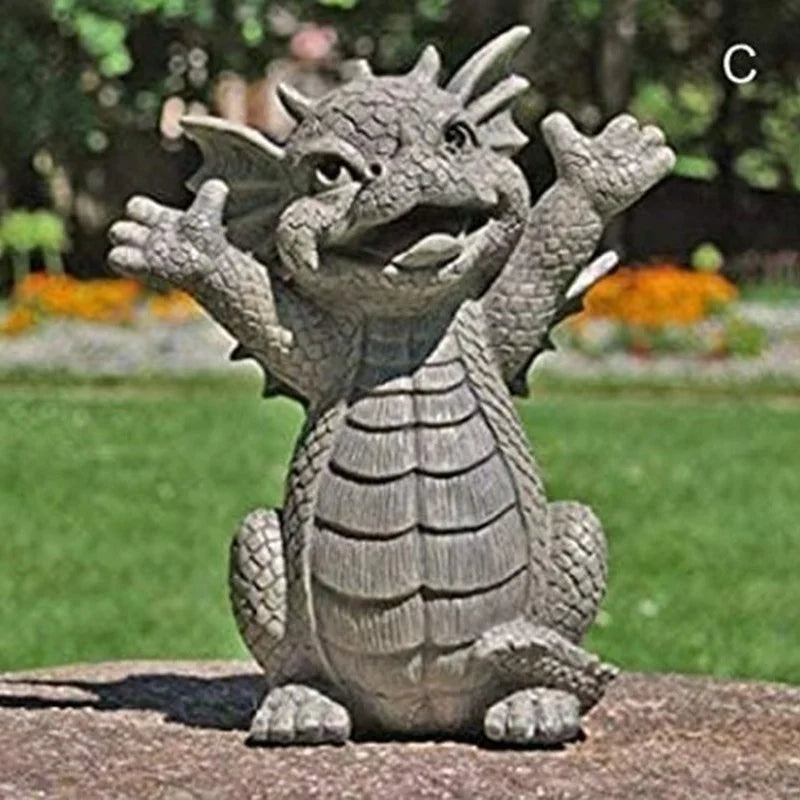 Resin dragon sculpture with arms raised, outdoor garden setting