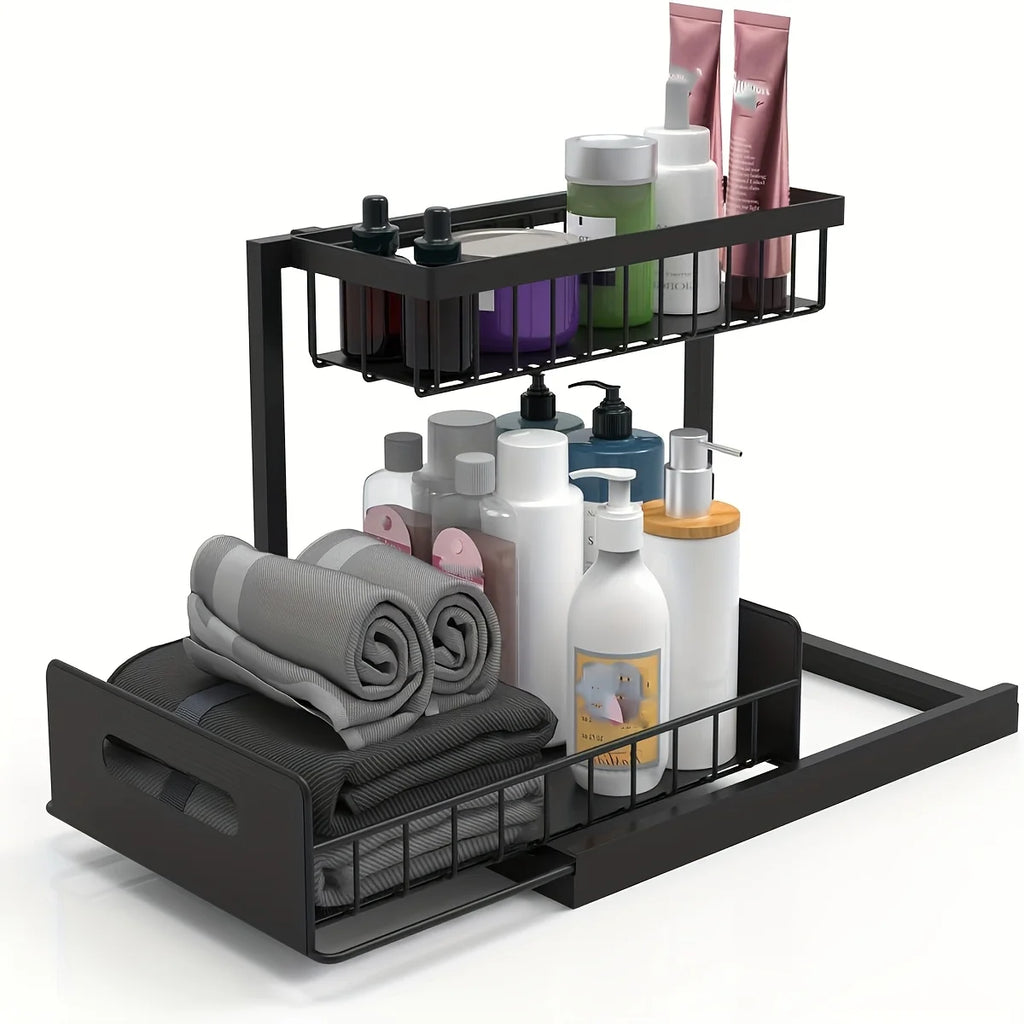Black steel sliding shelf organizer holding rolled towels and bath products on both tiers