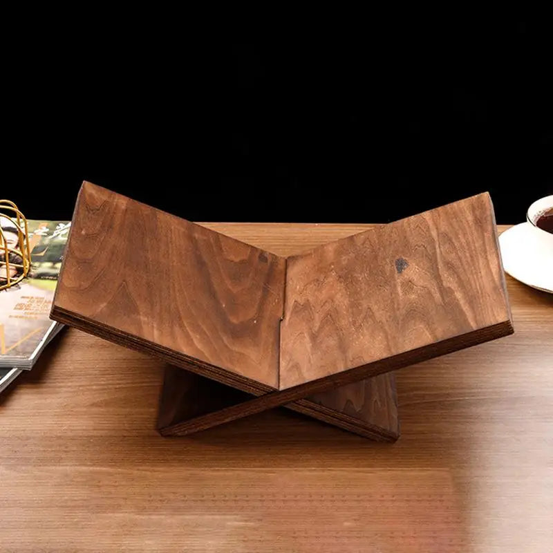 empty wooden crisscross book stand displayed on a tabletop