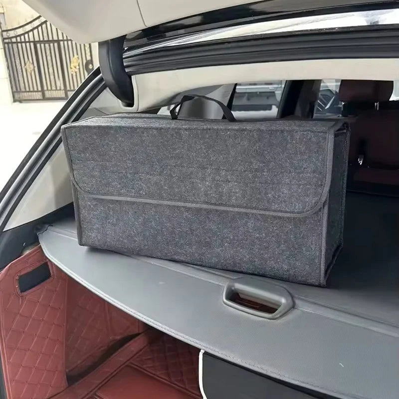 Grey felt trunk organizer sitting on a cargo shelf in a car