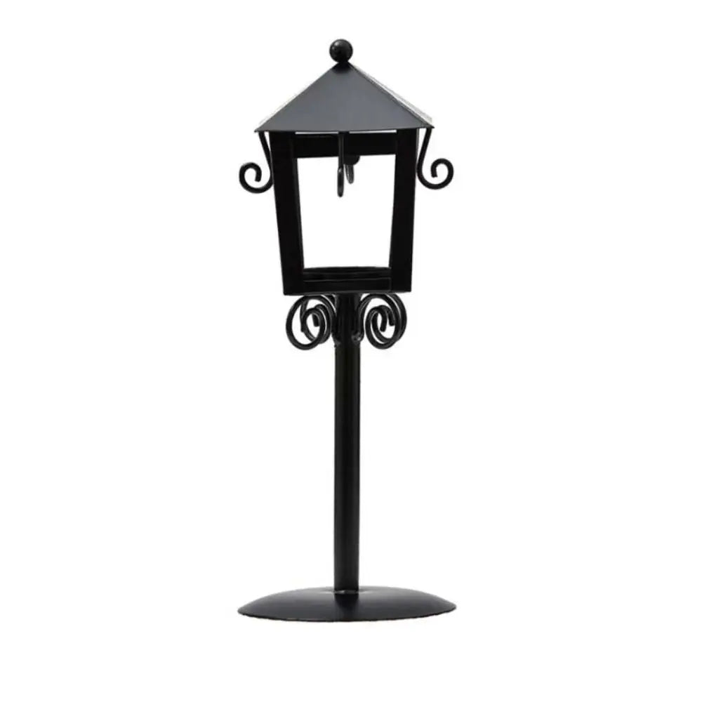 Black lantern-style candle holder facing forward
