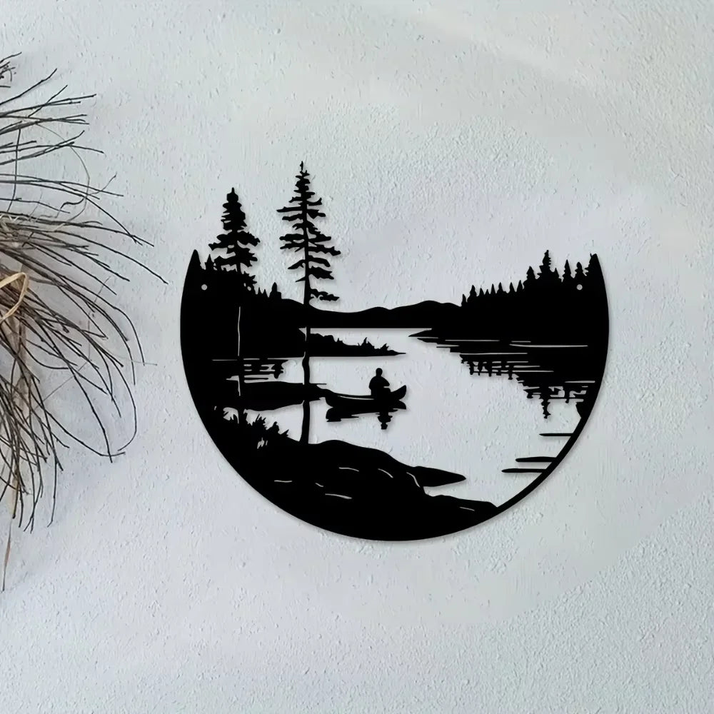 Round metal lake landscape wall art displayed on a white wall with botanical decor