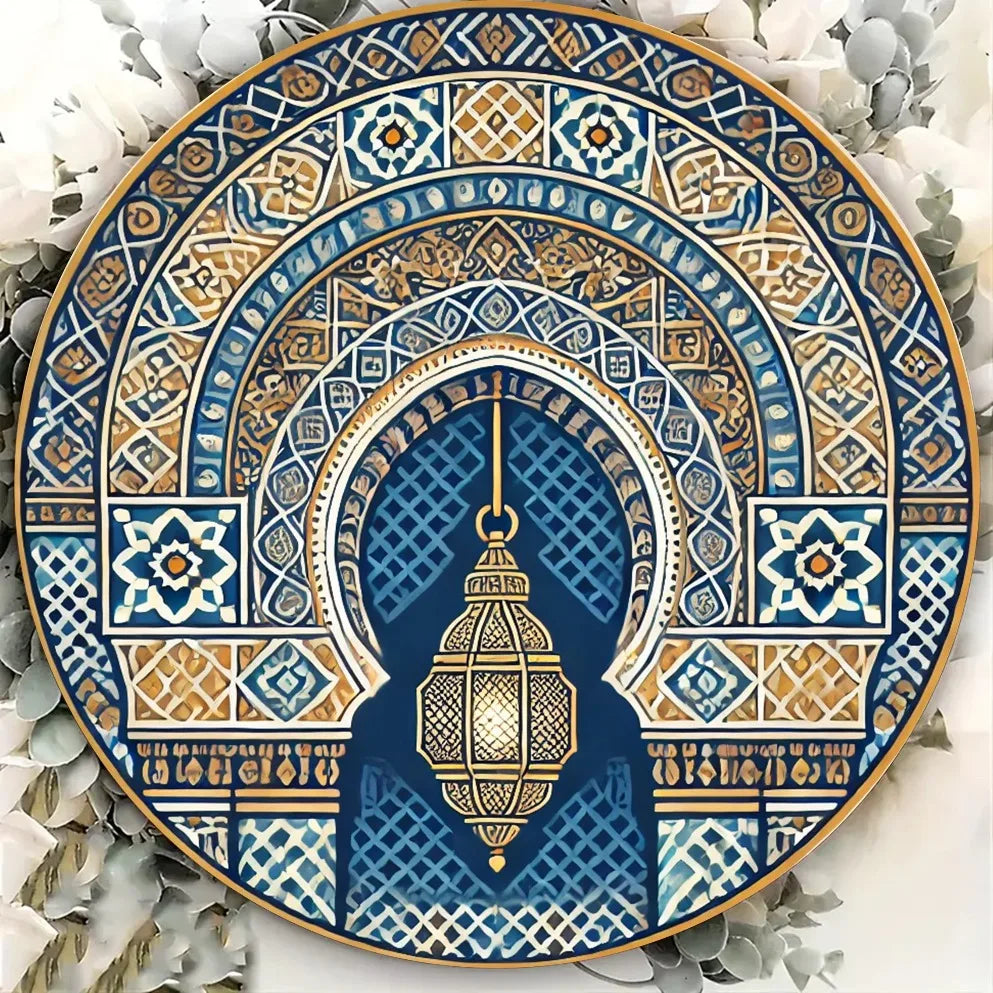 Moroccan geometric round metal wall art, blue and gold, styled with white flowers