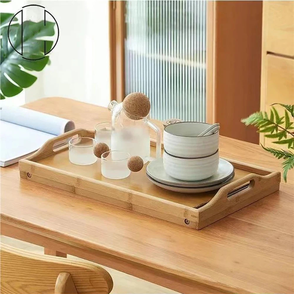 bamboo tray table used for serving breakfast dishes on a wooden dining table