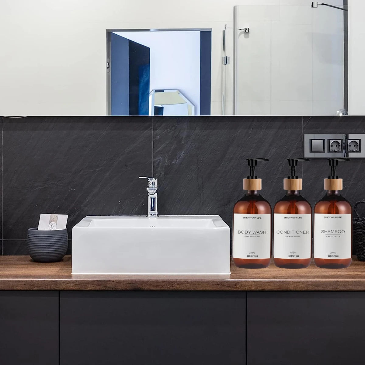 Set of amber plastic pump dispenser bottles arranged on a modern bathroom countertop by the sink