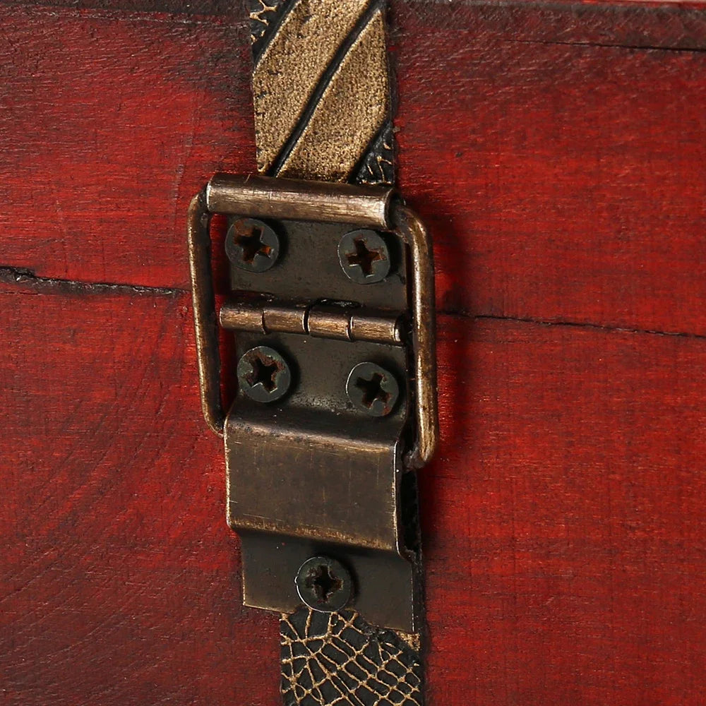 Close-up of retro bronze hinge detail on decorative wooden storage box