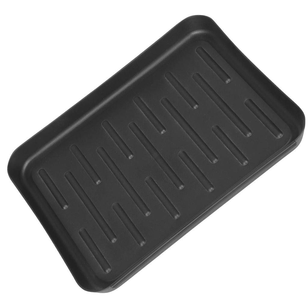 Black plastic boot and shoe tray shown from above on a white background
