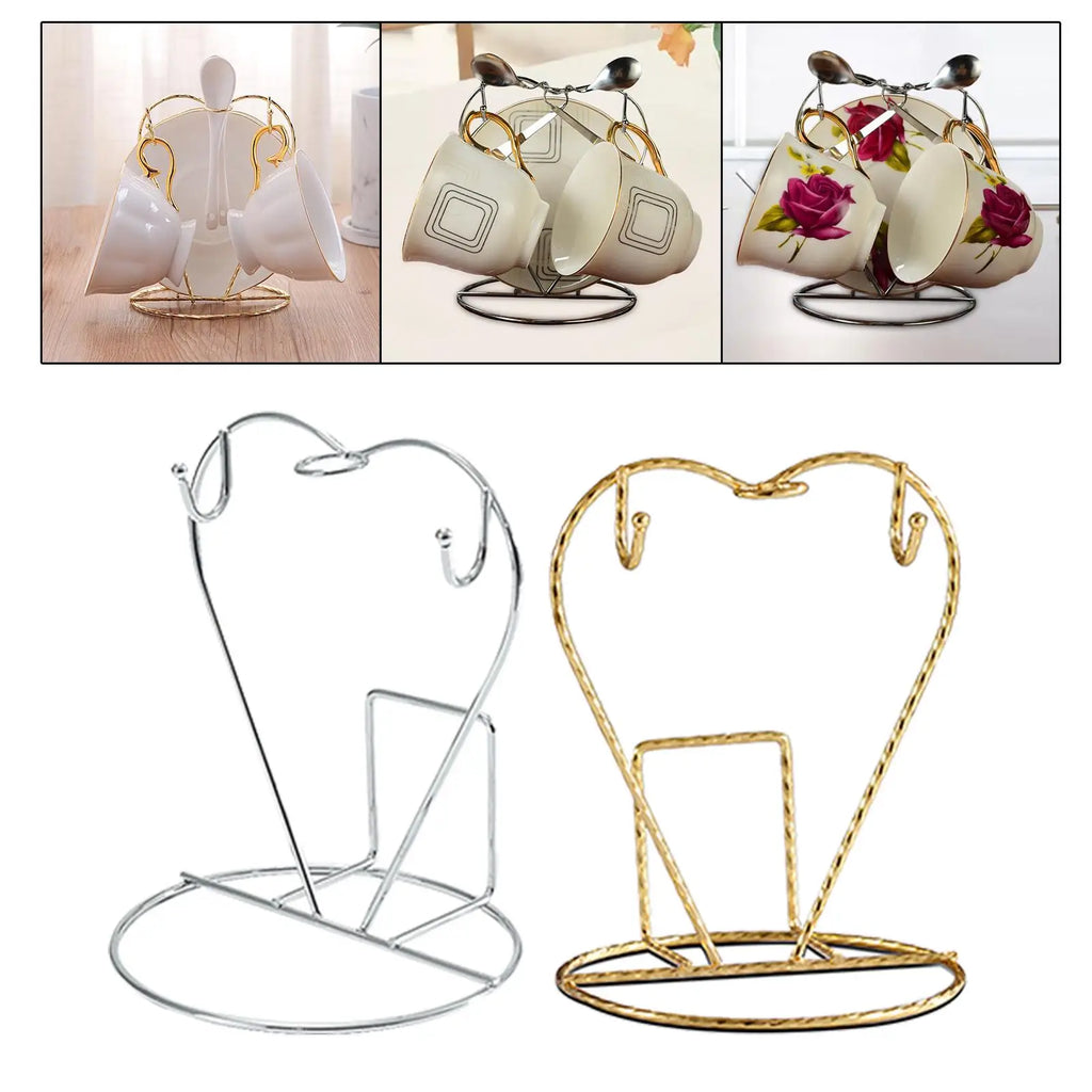heart-shaped metal mug holder stand in gold and silver with example of two mugs and spoons displayed