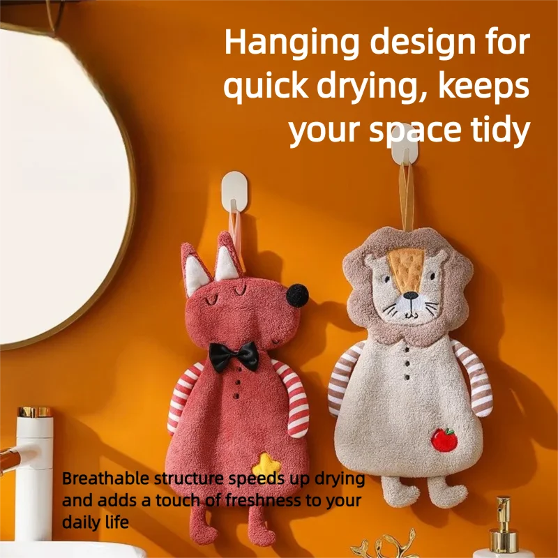 Fox and lion animal-shaped hand towels hanging in a bathroom with text about quick-drying design