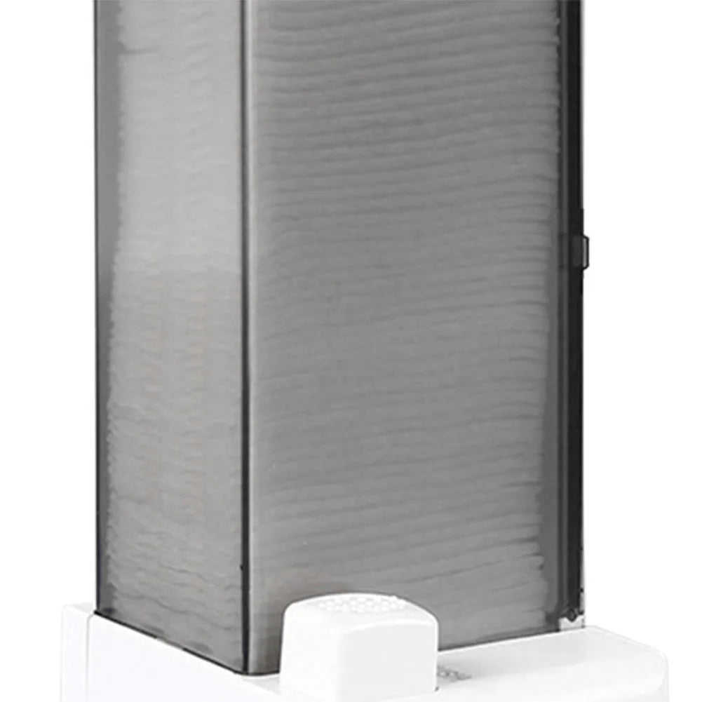 Closeup side view of the grey cotton pad dispenser showing press-out feature