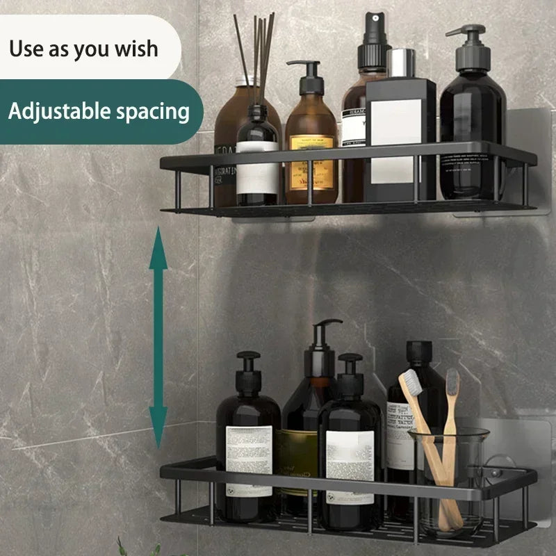 Matte black rectangular wall-mounted shelves with adjustable vertical spacing for bathroom storage.