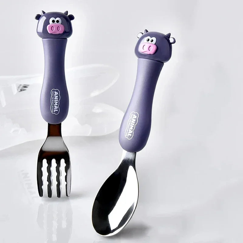 Close-up of cartoon calf handle kids fork and spoon set