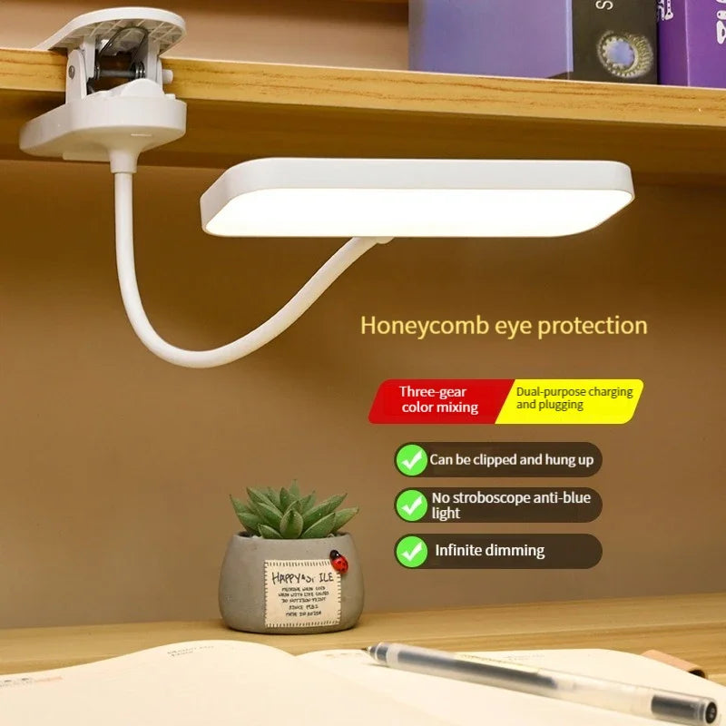White clip-on LED desk lamp attached to a shelf in a workspace, highlighting touch controls and flexible arm.