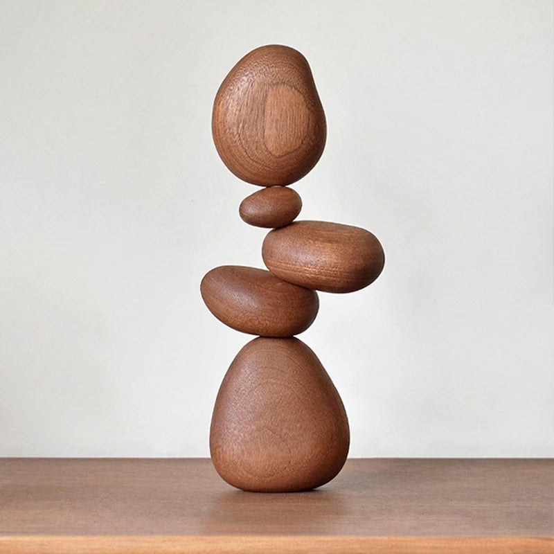 Stacking wooden stone sculpture standing on a tabletop