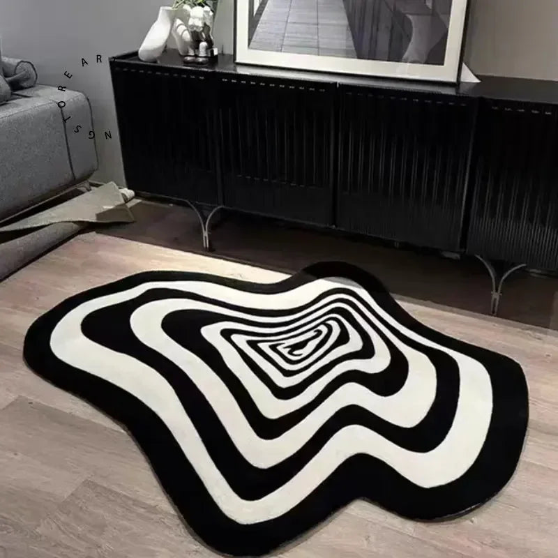 Black and white irregular geometric rug in a modern living room setting
