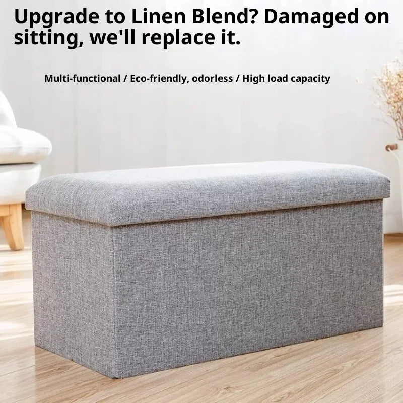Rectangular linen storage ottoman bench on a hardwood floor in a sunlit living room