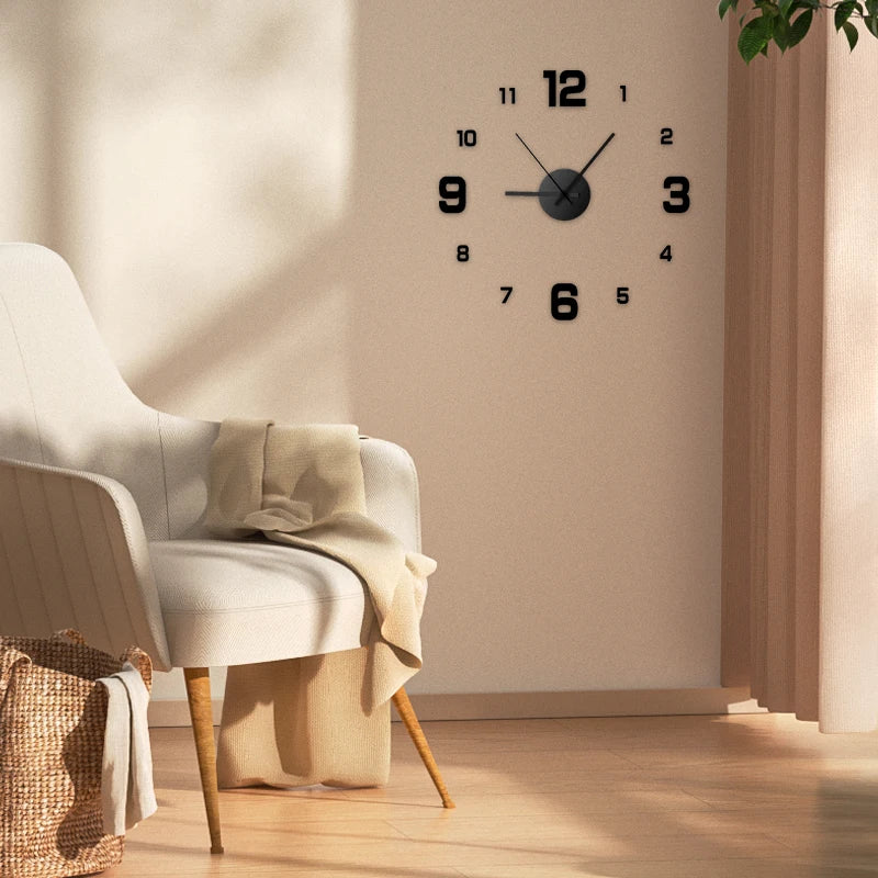 Black frameless wall clock on a light wall above an accent chair and basket in a living room