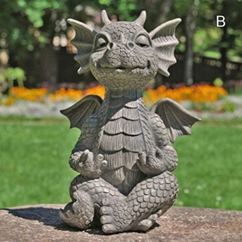 Resin dragon figurine in relaxed meditation pose, outdoors on a flat stone