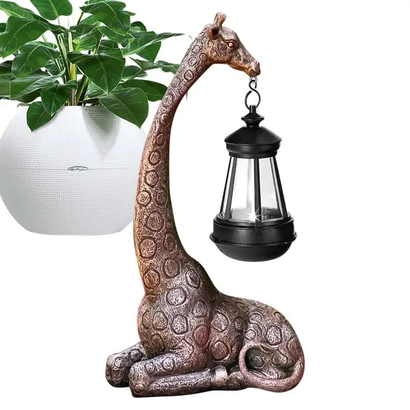 Giraffe solar lantern garden statue next to a white planter indoors