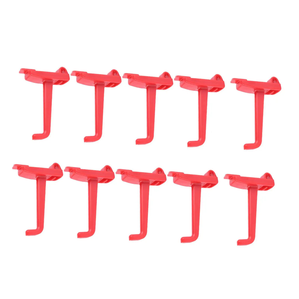 Red pegboard tool hooks displayed in a row for organizing tools